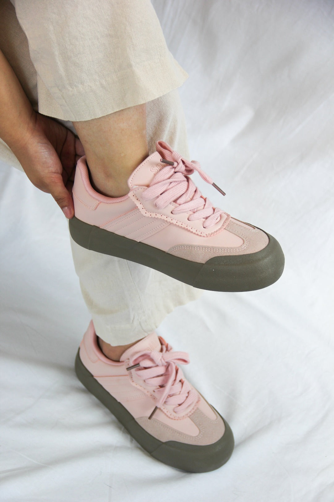 Model wearing Jena Pink Sneakers